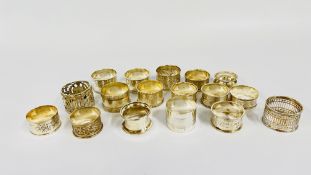 A COLLECTION OF 17 ASSORTED SILVER NAPKIN RINGS, VARIOUS ASSAYS AND MAKERS.