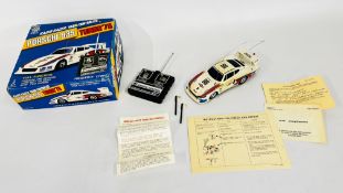 A RADIO-RACER RADIO CONTROLLED PORSCHE 935 TURBO '78, BOXED WITH REMOTE - SOLD AS SEEN.