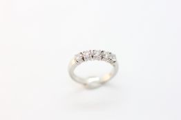 A PLATINUM FIVE STONE DIAMOND RING, THE SPREAD OF EACH BRILLIANT CUT STONE MEASURING APPROX 2.8MM.