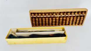 A SCOTTS CONCERT WOODEN RECORDER IN ORIGINAL BOX AND A JAPANESE ABACUS.