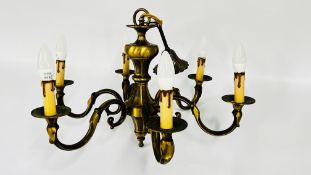 A HEAVY BRASS 6 BRANCH CHANDELIER - TO BE FITTED BY A QUALIFIED ELECTRICIAN - SOLD AS SEEN.