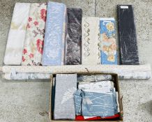 A GROUP OF FABRIC TO INCLUDE TWO ROLLS OF CURTAIN FABRIC AND APPROX 12 PART ROLLS OF VARIOUS