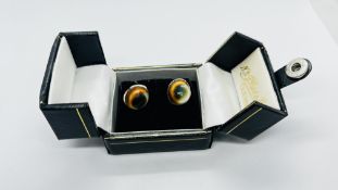 A PAIR OF VINTAGE SHELL STUD THREADED EARRINGS (THE BACKS MARKED 10K).