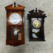 TWO WALL CLOCKS TO INCLUDE A VINTAGE OAK CASED EXAMPLE.