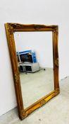 A JOHN LEWIS GILT FRAMED MIRROR 74 X 105CM.