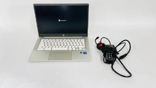 HP CHROMEBOOK AND CHARGER - SOLD AS SEEN.