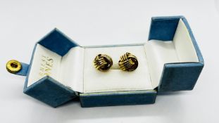 A PAIR OF 9CT GOLD KNOT CUFF LINKS IN ERNEST JONES PRESENTATION BOX.