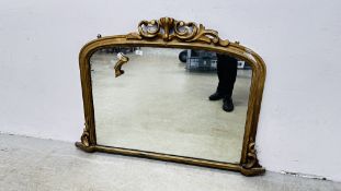 A VINTAGE GILT FRAMED OVER MANTEL MIRROR BEARING ORIGINAL LOCAL MAKER LABEL. L 122CM X H 87.5CM.
