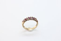 A 9CT GOLD RUBY AND DIAMOND DRESS RING,