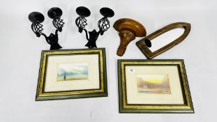 TWO FRAMED PICTURES AND TWO CANDLESTICK HOLDERS ALONG WITH A SMALL WALL MOUNTED SHELF.
