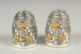 A pair of 800. silver beehive salt and peppers, 4cm.