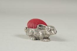 A silver rabbit pin cushion, 3.5cm.