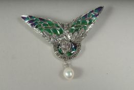A silver plique enamel and pearl swallow brooch in a box.