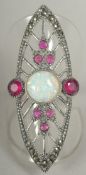 A silver ruby and opal marquise shaped ring, size N, in a box.