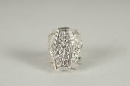 A SILVER COFFIN AND BAT SKELETON RING.