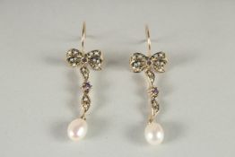 A PAIR OF 9CT GOLD AMETHYST AND PEARL BOW EARRINGS.