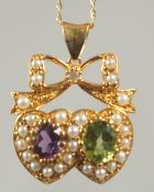 A silver gold plated sweetheart pendant and chain in a box.