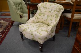 A Victorian small upholstered bedroom chair.