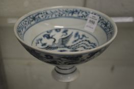 A Chinese blue and white pedestal bowl.