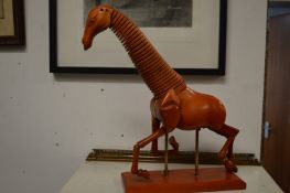 Two articulated artist's models of horses.