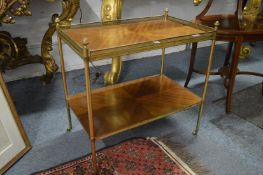 A mahogany and brass two-tier etagere.