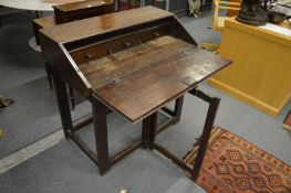 An 18th century oak clerks desk.
