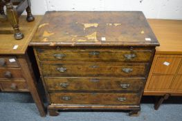An 18th century style walnut bachelor's chest (faults).