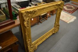 A good large modern decorative gilt framed mirror.