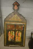 An Islamic painted lacquer wall mirror with folding doors.