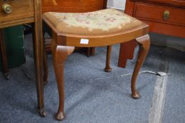 An Edwardian inlaid mahogany music seat and a dressing table stool.