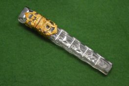 A good faceted and gold mounted long scent bottle.