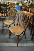 A 19th century beech and elm spindle back kitchen chair stamped Dancer & Hearne Bros together with