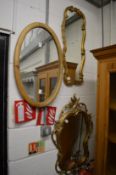 Three various wall mirrors.