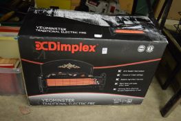 A Dimplex electric fire, boxed.