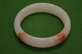 A Chinese jade bangle.
