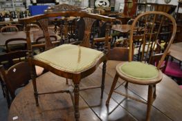 A corner armchair and a child's occasional chair.