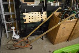 An old garden plough/tiller.