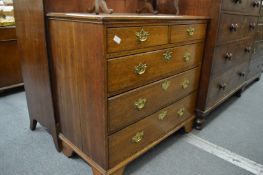 A George III oak chest of drawers.