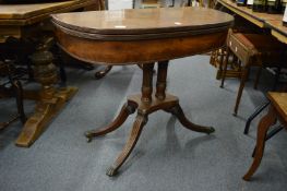 A 19th century mahogany D shaped fold-over tea table (faults).