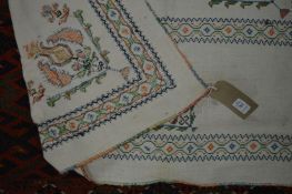 A needlework decorated bedspread with a floral design 6ft 3