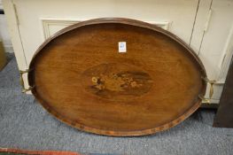 An Edwardian inlaid mahogany twin handled tray.