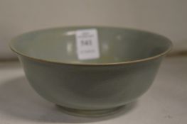 A Chinese celadon bowl.