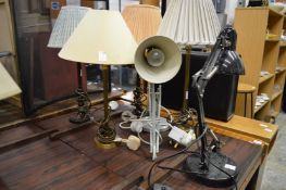 Angle poise lamps and table lamps.