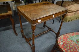 An oak occasional table.