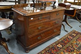 A mahogany chest of drawers.