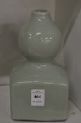 A Chinese celadon glazed vase.