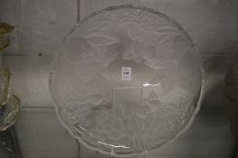 A large moulded glass dish.