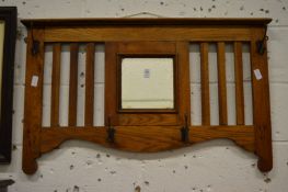 An oak hall mirror/coat rack.