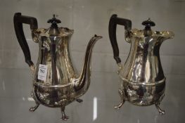 A Sheffield silver coffee pot with matching hot water jug.
