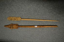 Two carved wood staff's or pointers.